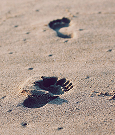 footsteps on sand - beach